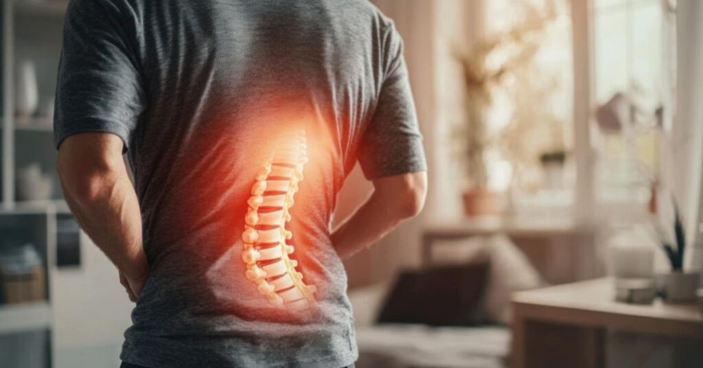 Person experiencing nerve signals weaken due to spine issues with numbness and consulting a neurosurgeon for evaluation